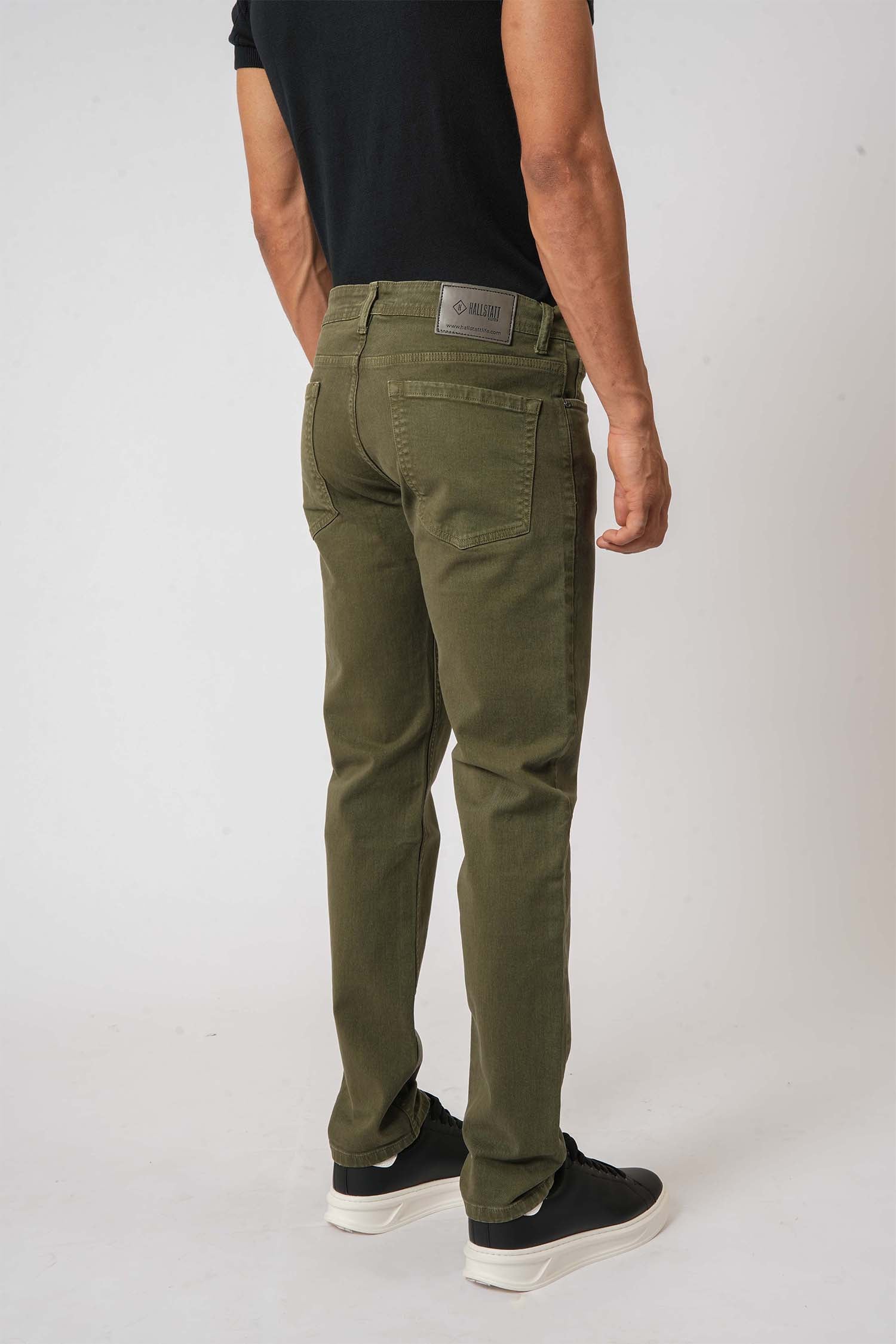 Men wearing casual olive green slim-fit denim jeans made by Hallstatt